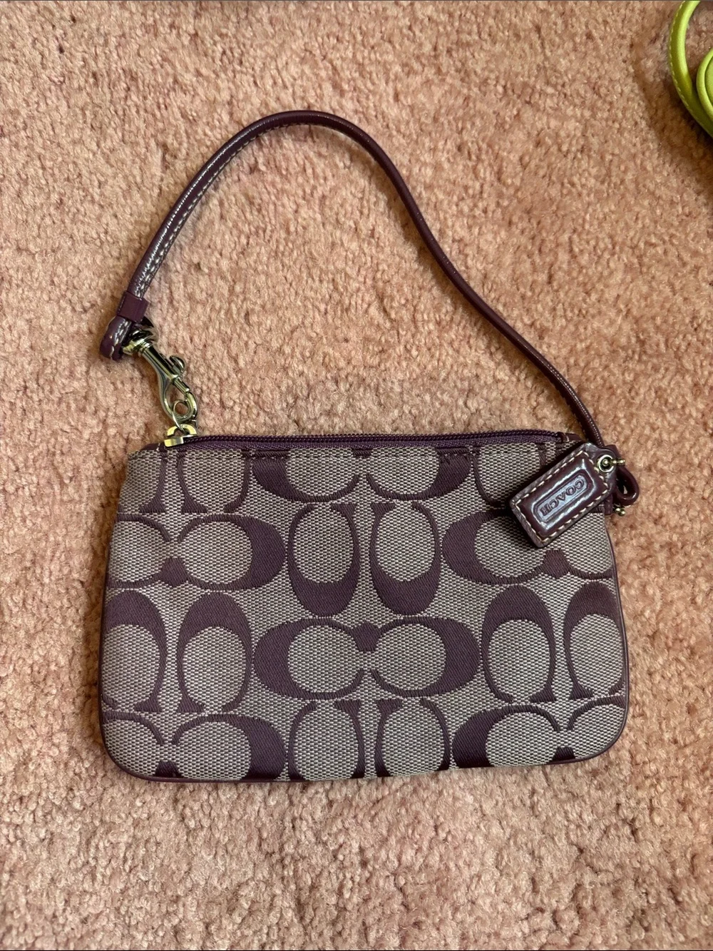 Coach Signature Canvas Wristlet in purple
